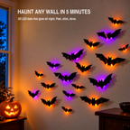 LED bat lights glowing purple and orange on a living room wall beside a window